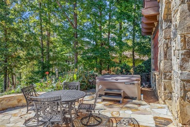 Breathtaking views of Lake Keowee's only waterfall frame this on The Cliffs At Keowee Falls in South Carolina - for sale on GolfHomes.com, golf home, golf lot