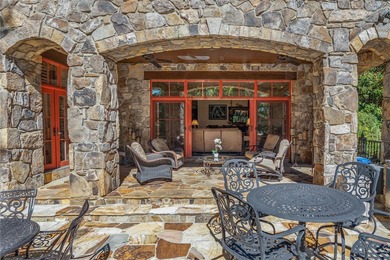 Breathtaking views of Lake Keowee's only waterfall frame this on The Cliffs At Keowee Falls in South Carolina - for sale on GolfHomes.com, golf home, golf lot
