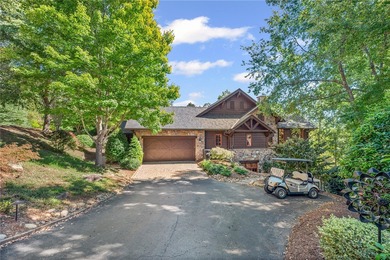 Breathtaking views of Lake Keowee's only waterfall frame this on The Cliffs At Keowee Falls in South Carolina - for sale on GolfHomes.com, golf home, golf lot