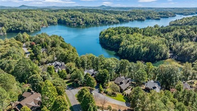 Breathtaking views of Lake Keowee's only waterfall frame this on The Cliffs At Keowee Falls in South Carolina - for sale on GolfHomes.com, golf home, golf lot