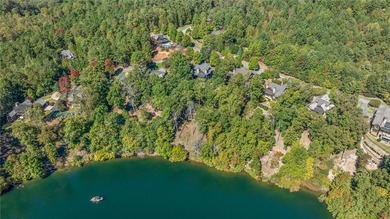 Breathtaking views of Lake Keowee's only waterfall frame this on The Cliffs At Keowee Falls in South Carolina - for sale on GolfHomes.com, golf home, golf lot