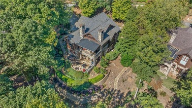 Breathtaking views of Lake Keowee's only waterfall frame this on The Cliffs At Keowee Falls in South Carolina - for sale on GolfHomes.com, golf home, golf lot