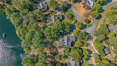 Breathtaking views of Lake Keowee's only waterfall frame this on The Cliffs At Keowee Falls in South Carolina - for sale on GolfHomes.com, golf home, golf lot
