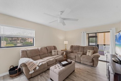 Step inside this beautiful END UNIT to be greeted by neutral on Capri Isle Golf Club in Florida - for sale on GolfHomes.com, golf home, golf lot