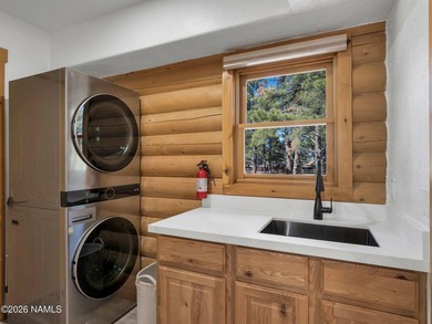 Discover Northern Arizona living in this rare true log cabin on Highland Meadows Golf Club in Arizona - for sale on GolfHomes.com, golf home, golf lot