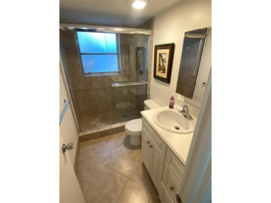 Fantastic corner garden apartment located on the ground floor on Oaks Country Club in Florida - for sale on GolfHomes.com, golf home, golf lot