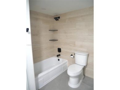 Beautifully updated 2-bedroom, 2-bath condo in the desirable on Palm-Aire Country Club and Resort - Palms in Florida - for sale on GolfHomes.com, golf home, golf lot