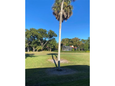 Fantastic corner garden apartment located on the ground floor on Oaks Country Club in Florida - for sale on GolfHomes.com, golf home, golf lot