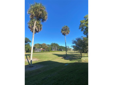 Fantastic corner garden apartment located on the ground floor on Oaks Country Club in Florida - for sale on GolfHomes.com, golf home, golf lot