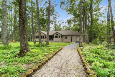 Enjoy sweeping golf course views and your own personal cart path on Gaylord Country Club in Michigan - for sale on GolfHomes.com, golf home, golf lot