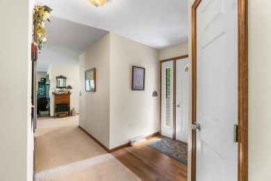 Enjoy sweeping golf course views and your own personal cart path on Gaylord Country Club in Michigan - for sale on GolfHomes.com, golf home, golf lot