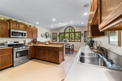 Enjoy sweeping golf course views and your own personal cart path on Gaylord Country Club in Michigan - for sale on GolfHomes.com, golf home, golf lot