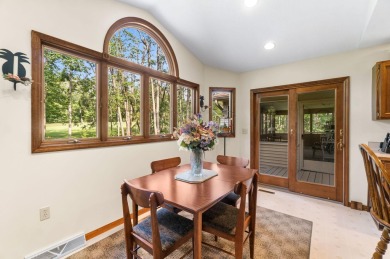 Enjoy sweeping golf course views and your own personal cart path on Gaylord Country Club in Michigan - for sale on GolfHomes.com, golf home, golf lot