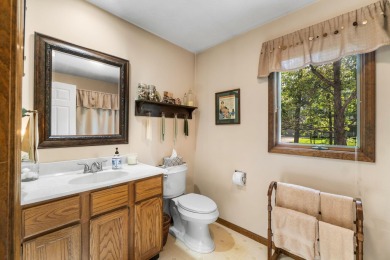 Enjoy sweeping golf course views and your own personal cart path on Gaylord Country Club in Michigan - for sale on GolfHomes.com, golf home, golf lot