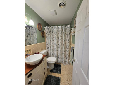 LOCATION, LOCATION, LOCATION... Welcome Home to this 3/2 on The Golf Club of Ocala in Florida - for sale on GolfHomes.com, golf home, golf lot