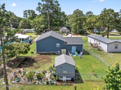 Welcome to 505 Magnolia Drive in peaceful 
Seaside Station. This on Oyster Bay Golf Links in North Carolina - for sale on GolfHomes.com, golf home, golf lot