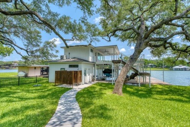Rare opportunity to own this fabulous waterfront home on a wide on Blue Lake Golf Club in Texas - for sale on GolfHomes.com, golf home, golf lot