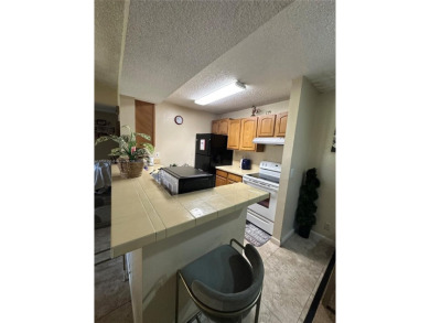 This beautifully  2-bedroom, 2-bathroom condo offers the perfect on Oaks Country Club in Florida - for sale on GolfHomes.com, golf home, golf lot