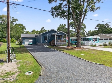 Welcome to 505 Magnolia Drive in peaceful 
Seaside Station. This on Oyster Bay Golf Links in North Carolina - for sale on GolfHomes.com, golf home, golf lot