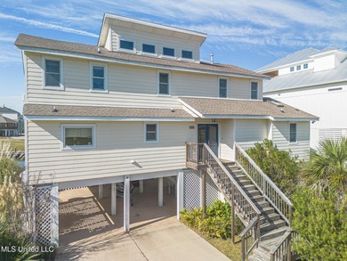 Waterfront 3-bed, 2.5-bath home in Timber Ridge with private on Pass Christian Isles Golf Club in Mississippi - for sale on GolfHomes.com, golf home, golf lot