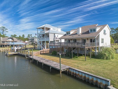 Waterfront 3-bed, 2.5-bath home in Timber Ridge with private on Pass Christian Isles Golf Club in Mississippi - for sale on GolfHomes.com, golf home, golf lot