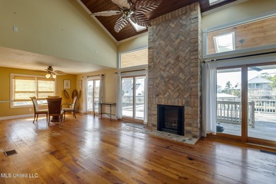 Waterfront 3-bed, 2.5-bath home in Timber Ridge with private on Pass Christian Isles Golf Club in Mississippi - for sale on GolfHomes.com, golf home, golf lot