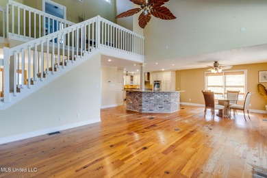 Waterfront 3-bed, 2.5-bath home in Timber Ridge with private on Pass Christian Isles Golf Club in Mississippi - for sale on GolfHomes.com, golf home, golf lot