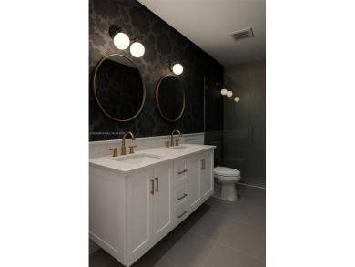 Located in Boca Grove, this charming remodel features a on Boca Grove Golf and Tennis in Florida - for sale on GolfHomes.com, golf home, golf lot