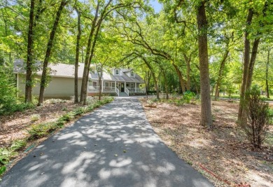Southern charm meets this 3BR 2BA  Cape Cod style cottage tucked on Holly Lake Ranch Golf Club in Texas - for sale on GolfHomes.com, golf home, golf lot