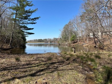 This 2.45 acre lake lot is located in Bent Tree, a gated on Bent Tree Golf Course in Georgia - for sale on GolfHomes.com, golf home, golf lot