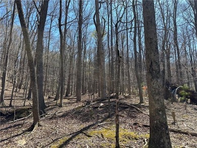 This 2.45 acre lake lot is located in Bent Tree, a gated on Bent Tree Golf Course in Georgia - for sale on GolfHomes.com, golf home, golf lot