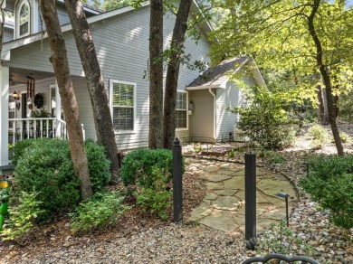 Southern charm meets this 3BR 2BA  Cape Cod style cottage tucked on Holly Lake Ranch Golf Club in Texas - for sale on GolfHomes.com, golf home, golf lot