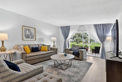 Remodeled First Floor Corner, Move in Ready Beautiful Garden on Wynmoor Golf Course in Florida - for sale on GolfHomes.com, golf home, golf lot