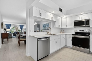 Remodeled First Floor Corner, Move in Ready Beautiful Garden on Wynmoor Golf Course in Florida - for sale on GolfHomes.com, golf home, golf lot