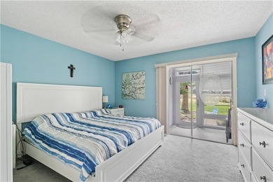 A rare gem! This 1st-floor end-unit sits in a unique Non-55+ on The American Golf Club in Florida - for sale on GolfHomes.com, golf home, golf lot