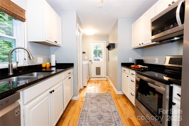 Beautifully furnished 3BR/2BA ranch ideally located within on Black Mountain Golf Course in North Carolina - for sale on GolfHomes.com, golf home, golf lot