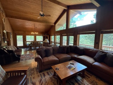 Conveniently located 3 bedrooms, 2 1/2-bathroom cabin in Angel on Angel Fire Resort Country Club in New Mexico - for sale on GolfHomes.com, golf home, golf lot