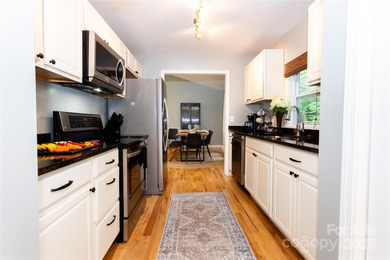 Beautifully furnished 3BR/2BA ranch ideally located within on Black Mountain Golf Course in North Carolina - for sale on GolfHomes.com, golf home, golf lot