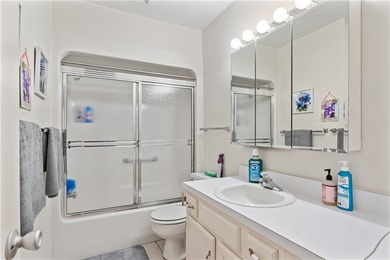 A rare gem! This 1st-floor end-unit sits in a unique Non-55+ on The American Golf Club in Florida - for sale on GolfHomes.com, golf home, golf lot