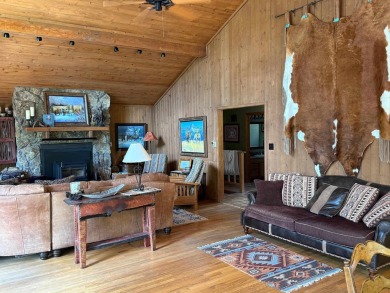 Conveniently located 3 bedrooms, 2 1/2-bathroom cabin in Angel on Angel Fire Resort Country Club in New Mexico - for sale on GolfHomes.com, golf home, golf lot