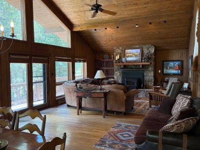 Conveniently located 3 bedrooms, 2 1/2-bathroom cabin in Angel on Angel Fire Resort Country Club in New Mexico - for sale on GolfHomes.com, golf home, golf lot