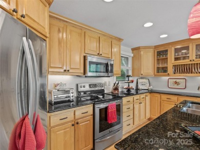 Embrace the mountain lifestyle in this 3BR/3BA townhome in a on Mt. Mitchell Golf Course in North Carolina - for sale on GolfHomes.com, golf home, golf lot