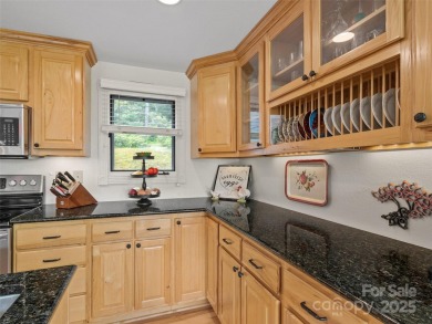 Embrace the mountain lifestyle in this 3BR/3BA townhome in a on Mt. Mitchell Golf Course in North Carolina - for sale on GolfHomes.com, golf home, golf lot