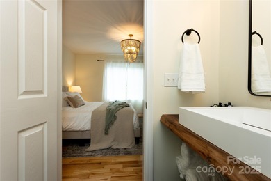 Beautifully furnished 3BR/2BA ranch ideally located within on Black Mountain Golf Course in North Carolina - for sale on GolfHomes.com, golf home, golf lot
