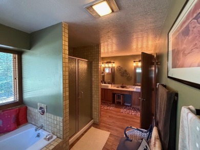 Conveniently located 3 bedrooms, 2 1/2-bathroom cabin in Angel on Angel Fire Resort Country Club in New Mexico - for sale on GolfHomes.com, golf home, golf lot