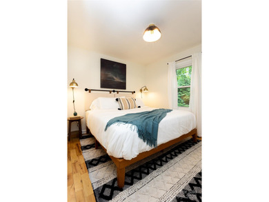 Beautifully furnished 3BR/2BA ranch ideally located within on Black Mountain Golf Course in North Carolina - for sale on GolfHomes.com, golf home, golf lot