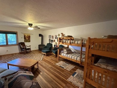 Conveniently located 3 bedrooms, 2 1/2-bathroom cabin in Angel on Angel Fire Resort Country Club in New Mexico - for sale on GolfHomes.com, golf home, golf lot