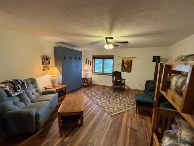 Conveniently located 3 bedrooms, 2 1/2-bathroom cabin in Angel on Angel Fire Resort Country Club in New Mexico - for sale on GolfHomes.com, golf home, golf lot