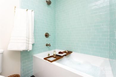 Beautifully furnished 3BR/2BA ranch ideally located within on Black Mountain Golf Course in North Carolina - for sale on GolfHomes.com, golf home, golf lot