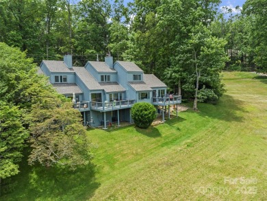 Embrace the mountain lifestyle in this 3BR/3BA townhome in a on Mt. Mitchell Golf Course in North Carolina - for sale on GolfHomes.com, golf home, golf lot